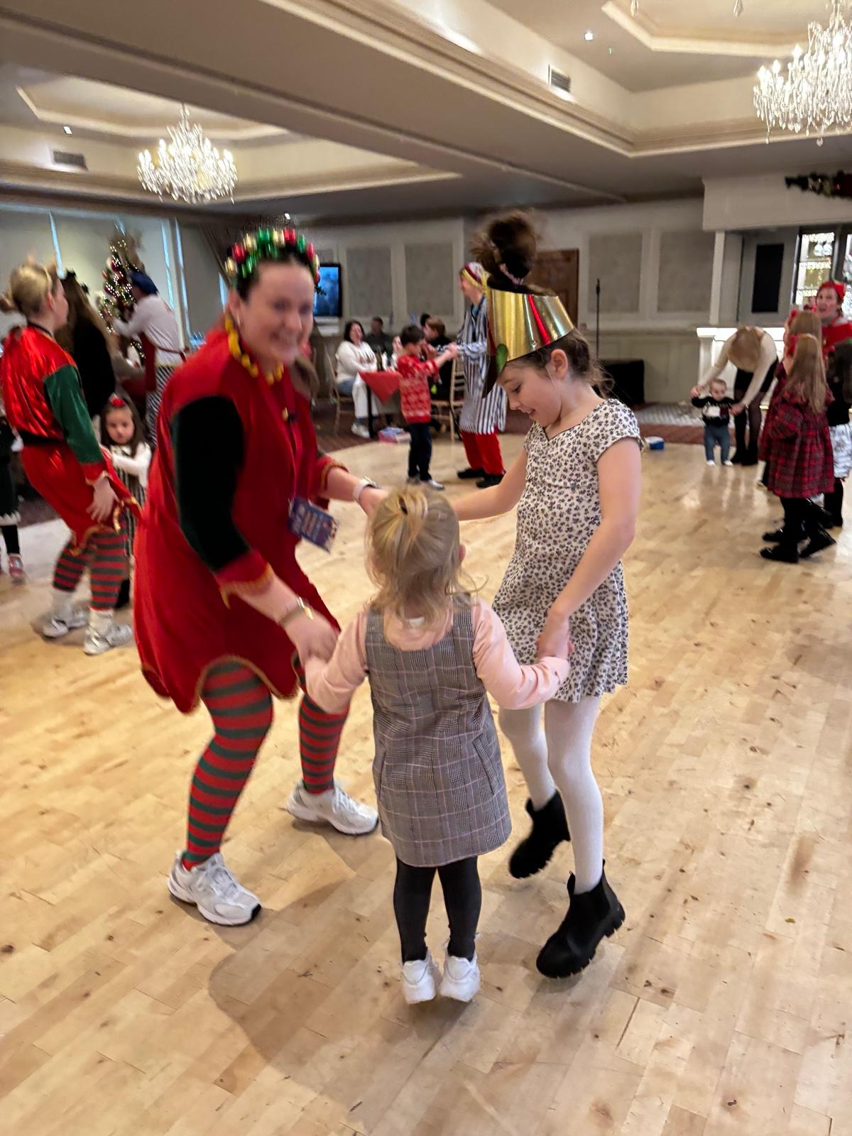 Christmas Party — Family Dancing